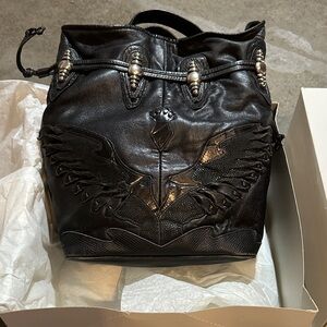Black Leather Shoulder Bucket Bag with Wing Embossed Detail